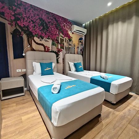 Suncoast Rooms Port Side ซารานเดอ ภายนอก รูปภาพ